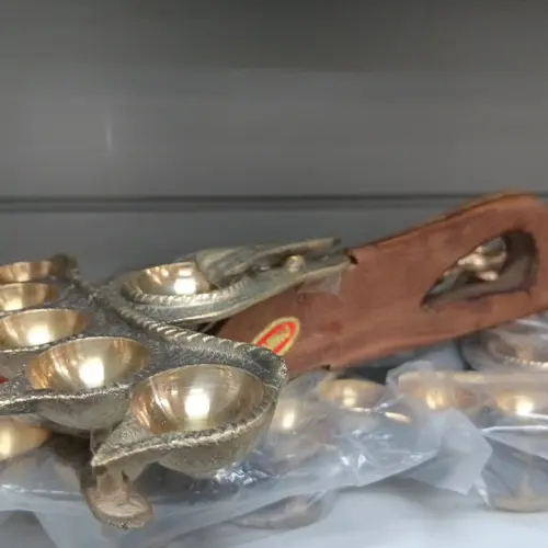 Brass panch diya aarti with wooden handle