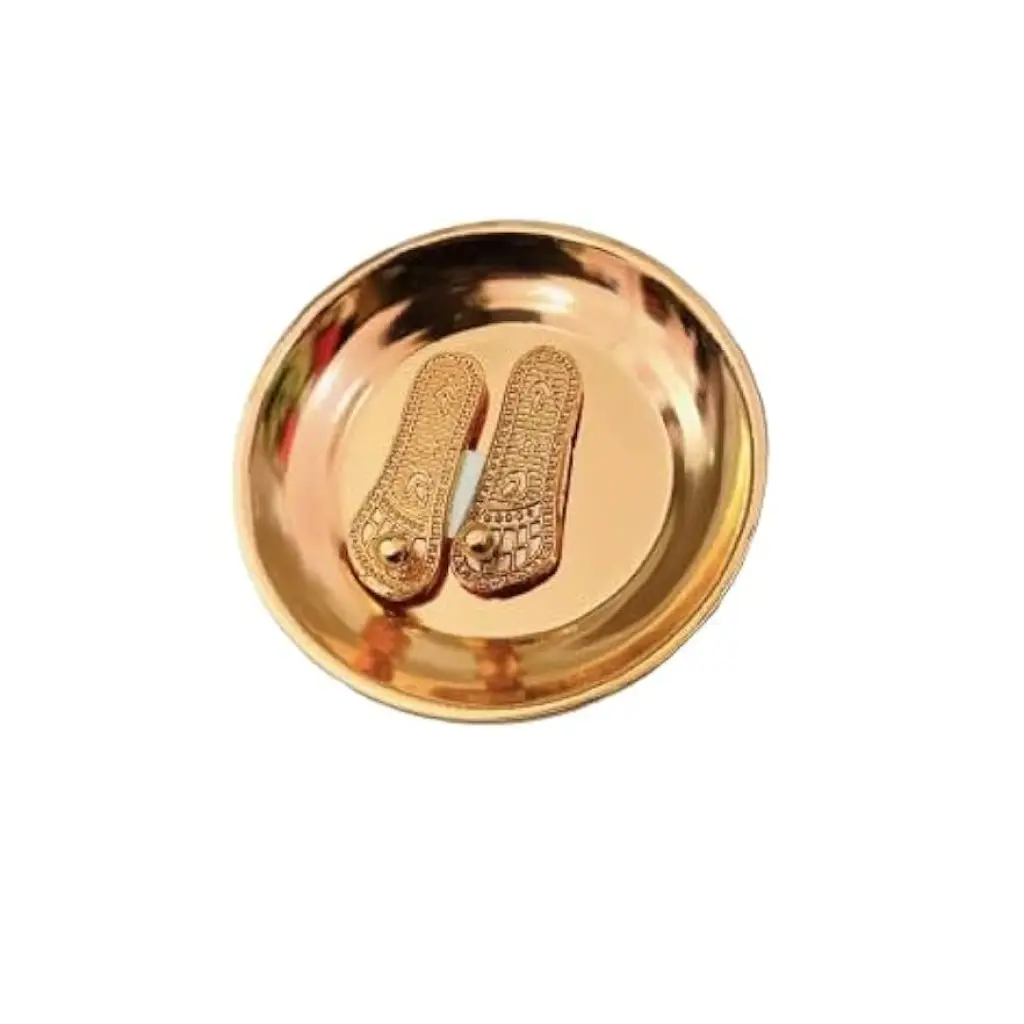 Brass plated charan paduka with tray